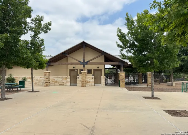 a view of a park with swings