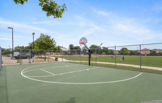 an aerial view of a house with swimming pool