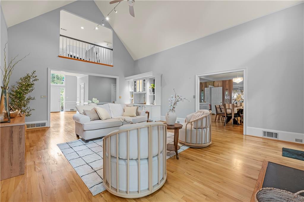 1696 Harts Run Atlanta, GA 30341 - Photo 14 of 55 a living room with fireplace furniture and a wooden floor