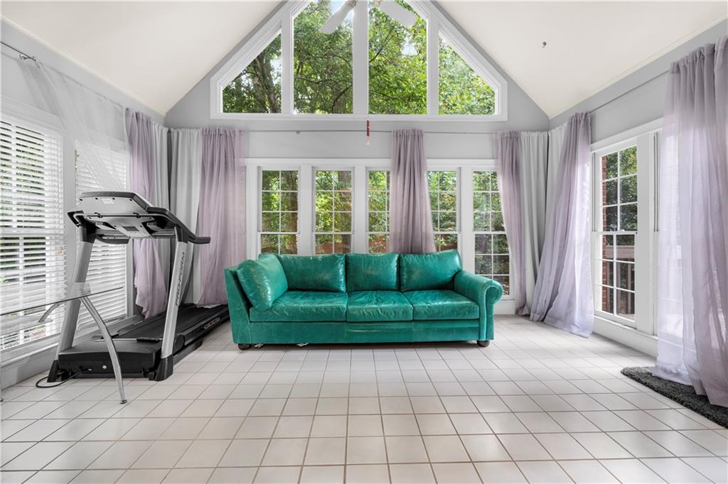 1696 Harts Run Atlanta, GA 30341 - Photo 23 of 55 a living room with furniture and a large window