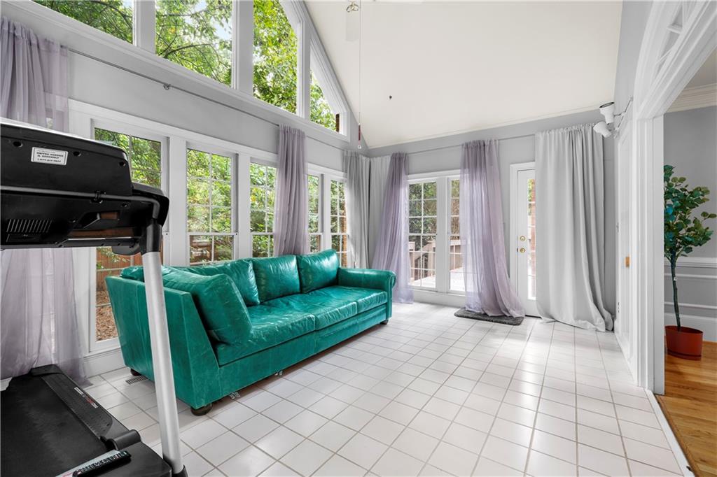 1696 Harts Run Atlanta, GA 30341 - Photo 24 of 55 a living room with furniture and a fireplace