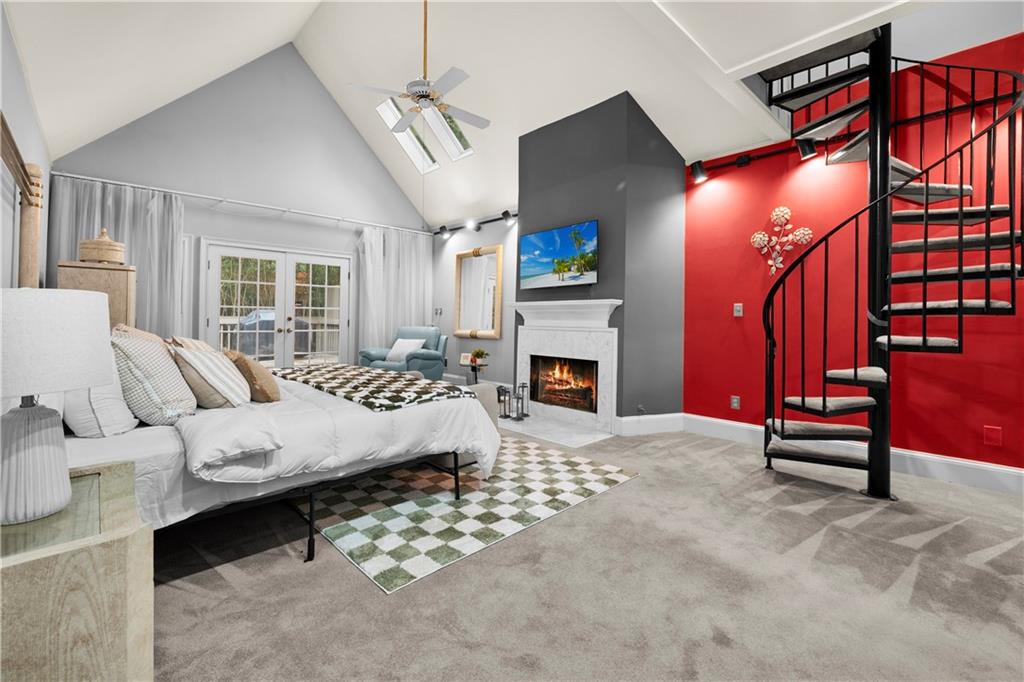 1696 Harts Run Atlanta, GA 30341 - Photo 26 of 55 a living room with furniture a fireplace and a chandelier