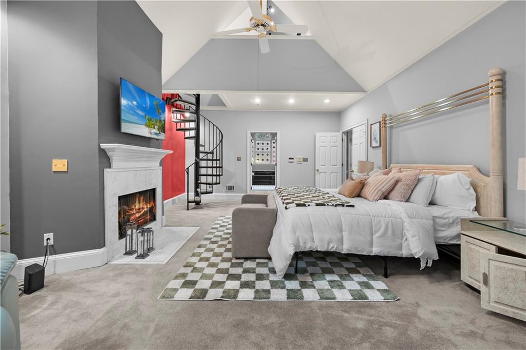 1696 Harts Run Atlanta, GA 30341 - Photo 27 of 55 a bed room with a bed and a fireplace