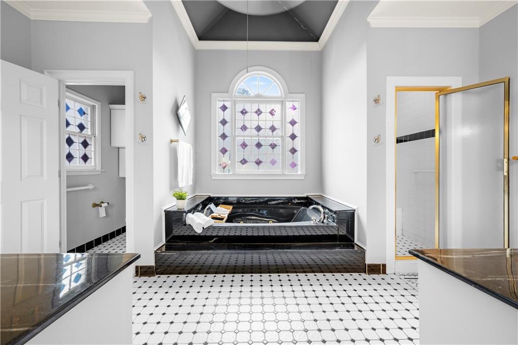 1696 Harts Run Atlanta, GA 30341 - Photo 29 of 55 a bedroom with a bed and a window