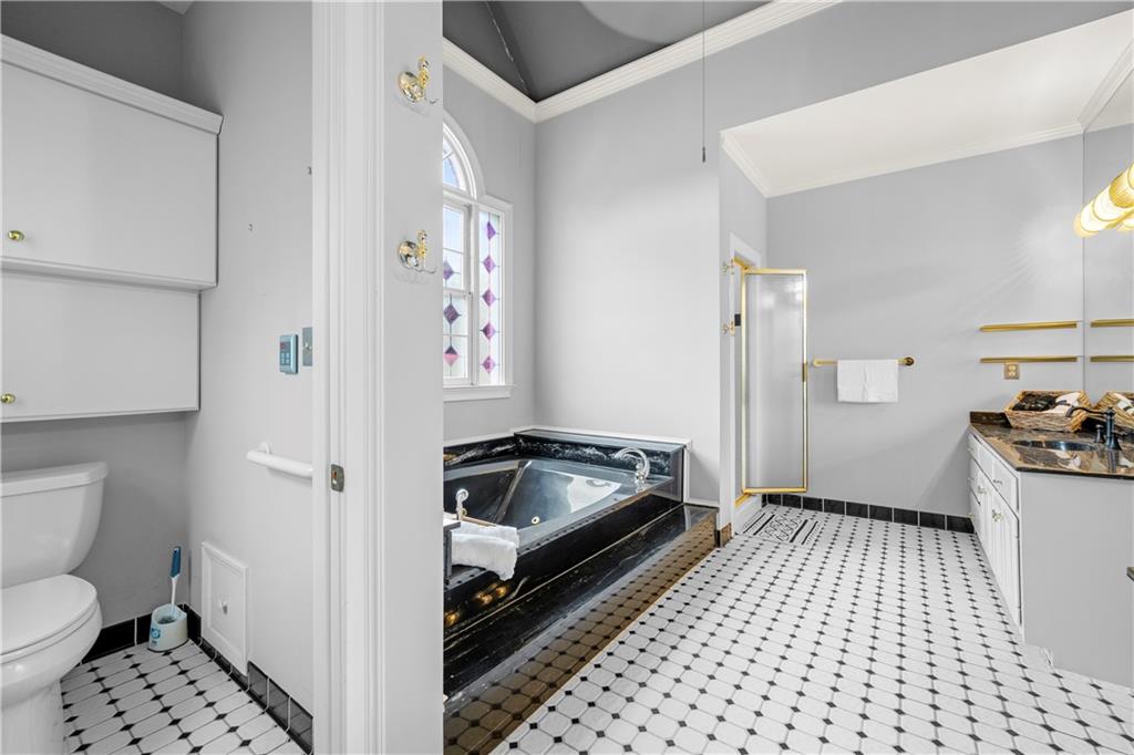 1696 Harts Run Atlanta, GA 30341 - Photo 30 of 55 a kitchen with a refrigerator and a stove