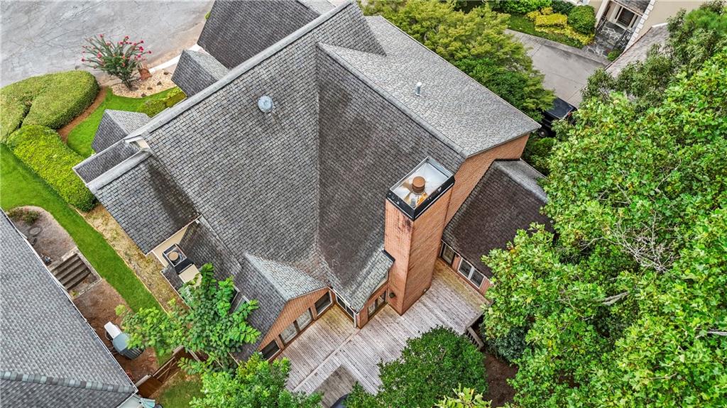 1696 Harts Run Atlanta, GA 30341 - Photo 3 of 55 an aerial view of a house with a yard and garden