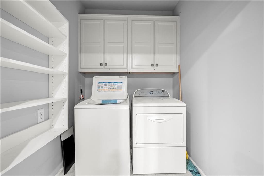1696 Harts Run Atlanta, GA 30341 - Photo 34 of 55 a utility room with dryer and washer