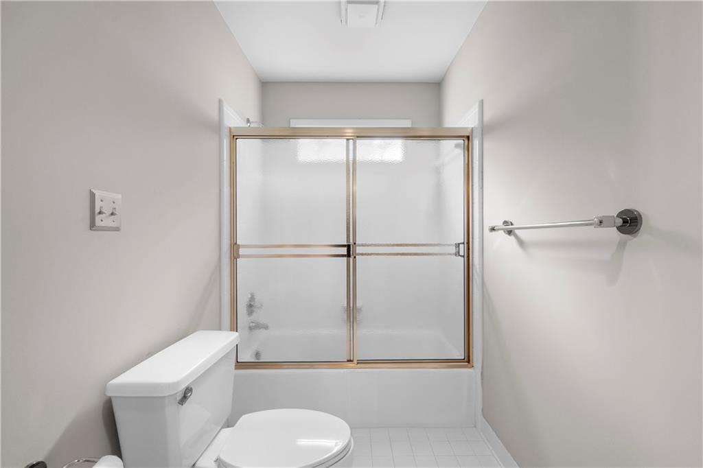 1696 Harts Run Atlanta, GA 30341 - Photo 48 of 55 a bathroom with a toilet and a shower