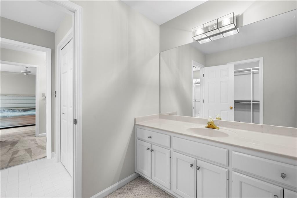 1696 Harts Run Atlanta, GA 30341 - Photo 50 of 55 a view of a sink vanity and a mirror