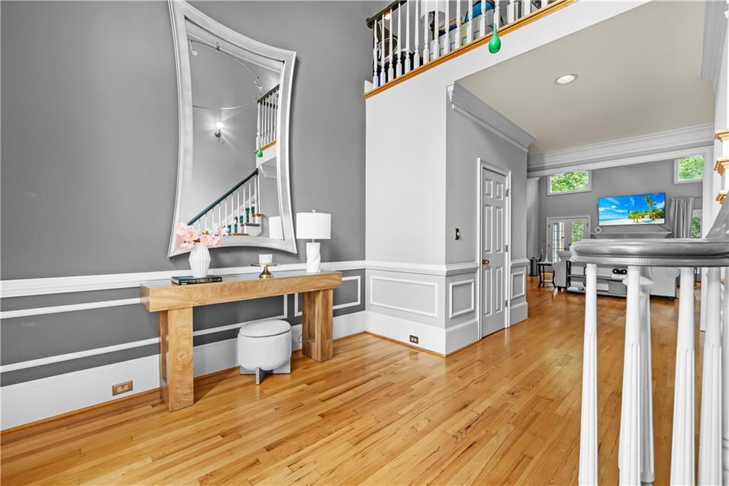 1696 Harts Run Atlanta, GA 30341 - Photo 7 of 55 a view interior of kitchen and hall with wooden floor