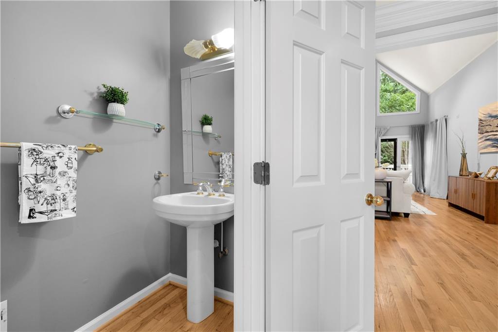 1696 Harts Run Atlanta, GA 30341 - Photo 10 of 55 a bathroom with a sink and a mirror