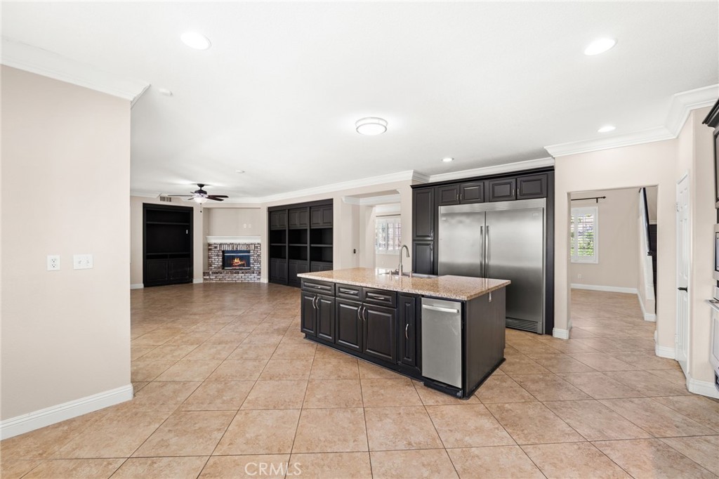 5105 Sanchez Court Rancho Cucamonga, CA 91739 - Photo 11 of 61 a large kitchen with a stove and a refrigerator