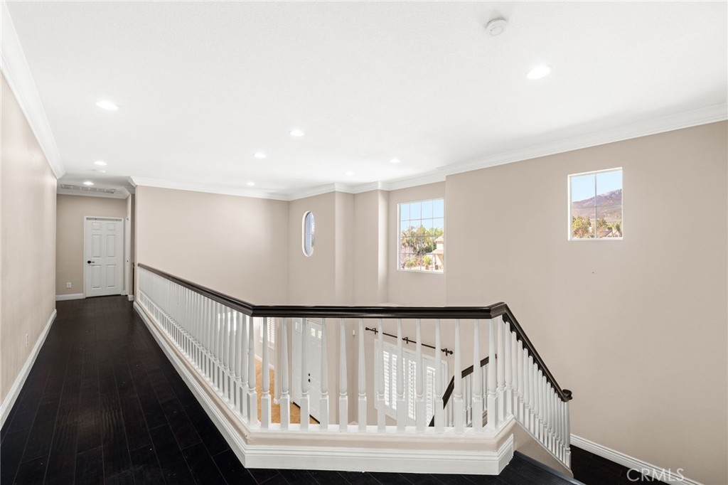5105 Sanchez Court Rancho Cucamonga, CA 91739 - Photo 21 of 61 a view of staircase with railing and a window