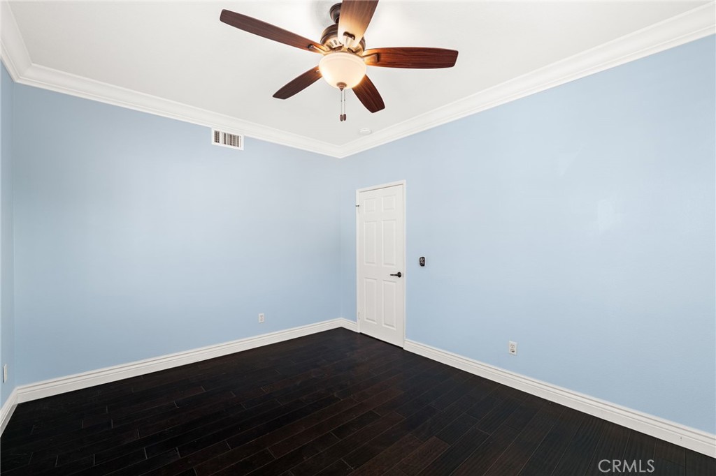 5105 Sanchez Court Rancho Cucamonga, CA 91739 - Photo 24 of 61 a view of an empty room with wooden floor
