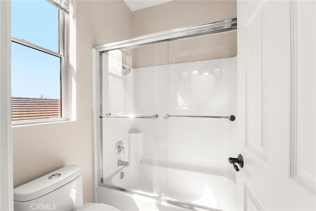 5105 Sanchez Court Rancho Cucamonga, CA 91739 - Photo 36 of 61 a bathroom with a shower and a toilet