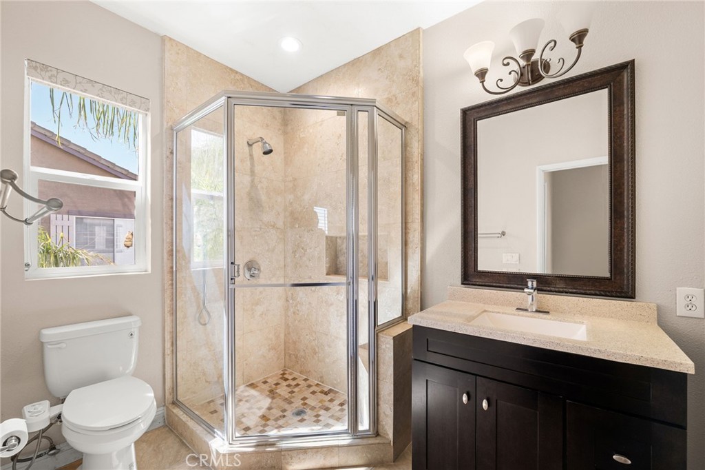 5105 Sanchez Court Rancho Cucamonga, CA 91739 - Photo 39 of 61 a bathroom with a sink a toilet and shower