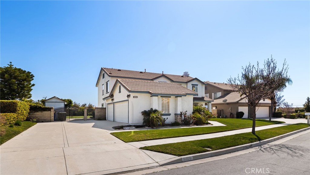 5105 Sanchez Court Rancho Cucamonga, CA 91739 - Photo 55 of 61 a front view of a house with a yard