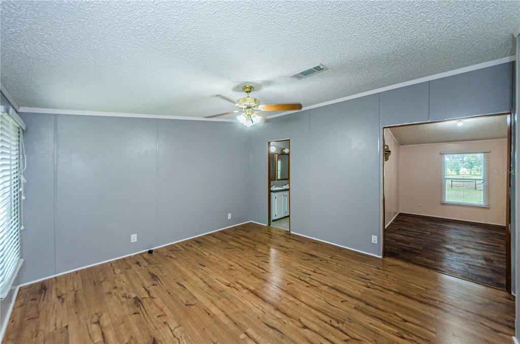 11118 Brahman Road Lithia, FL 33547 - Photo 18 of 60 Master with view to Bonus Room