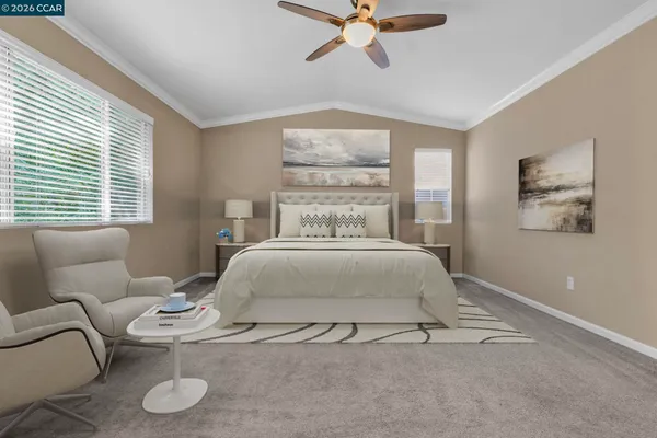 a bedroom with bed and window