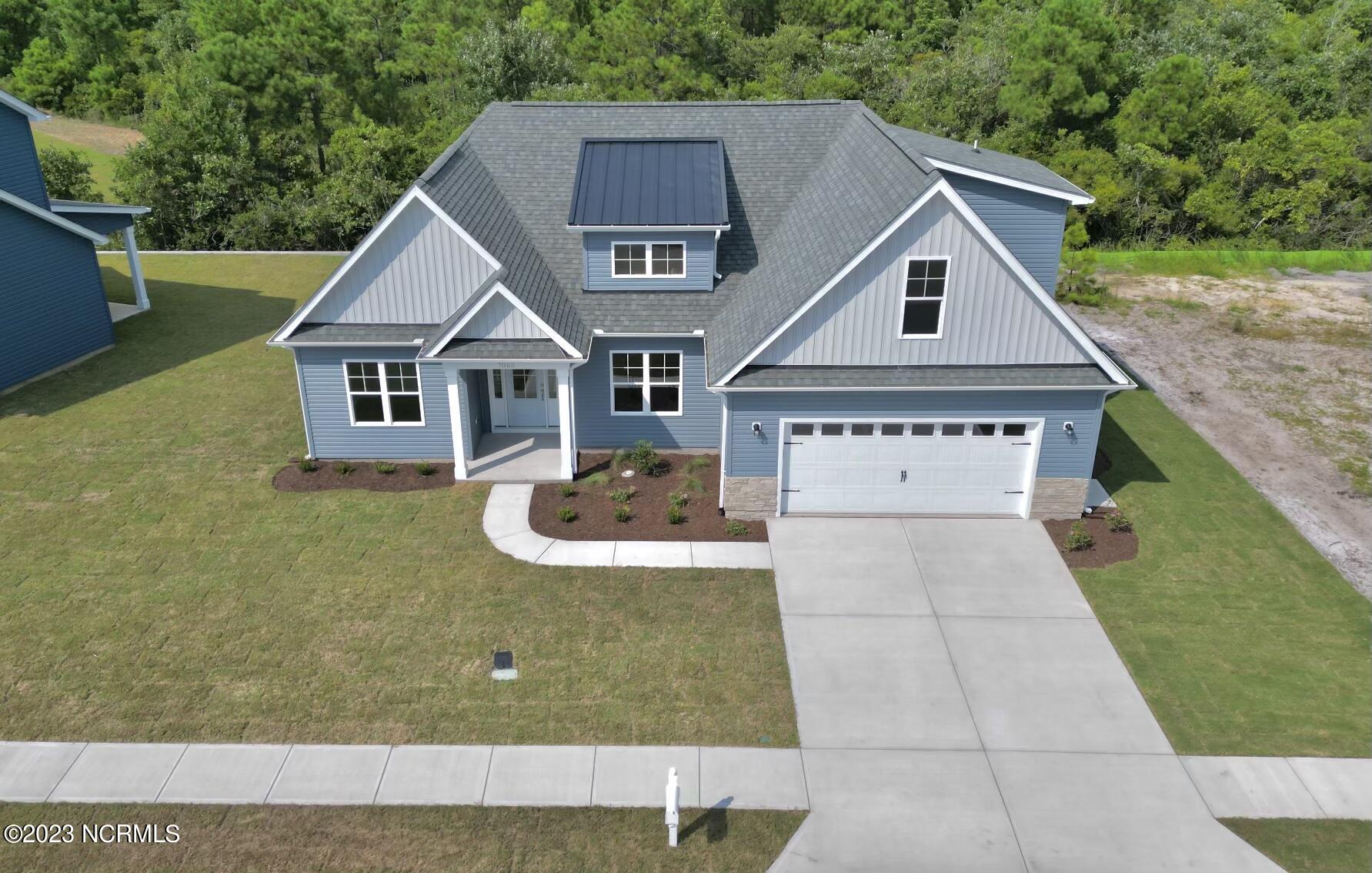 7065 Trailhead Road Leland, NC 28451 - Photo 2 of 41 EA0F309F-D632-4470-BDD7-B003CDFC8CA3