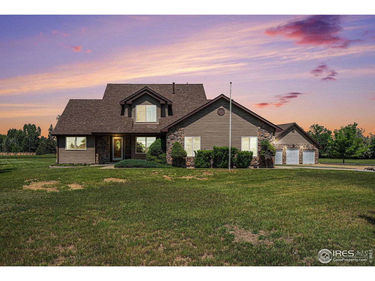 1625 Green Ridge Road Berthoud, CO 80513 - Photo 4 of 35 Front at twilight