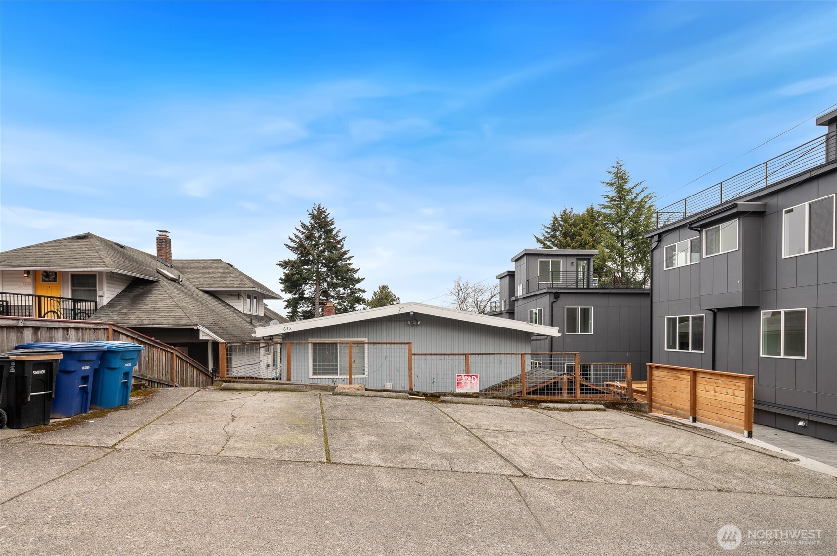 633 West Emerson Street Seattle, WA 98119 - Photo 11 of 25 a front view of a house with a yard