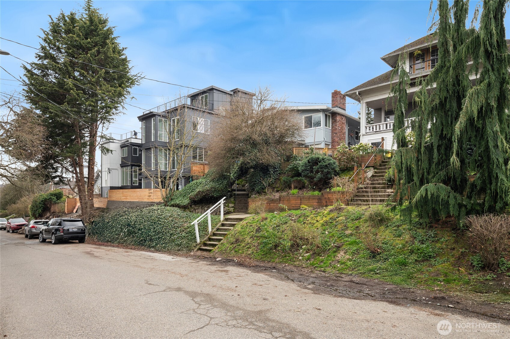 633 West Emerson Street Seattle, WA 98119 - Photo 2 of 25 a front view of a house with a garden