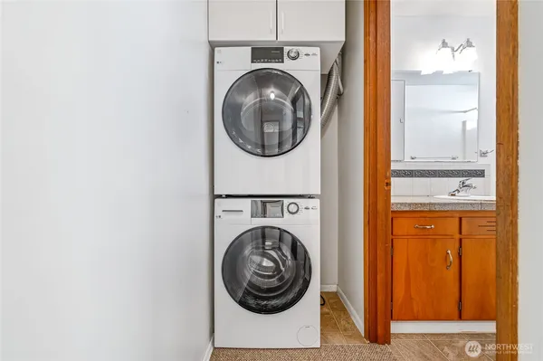 a view of washer and dryer in a utility room