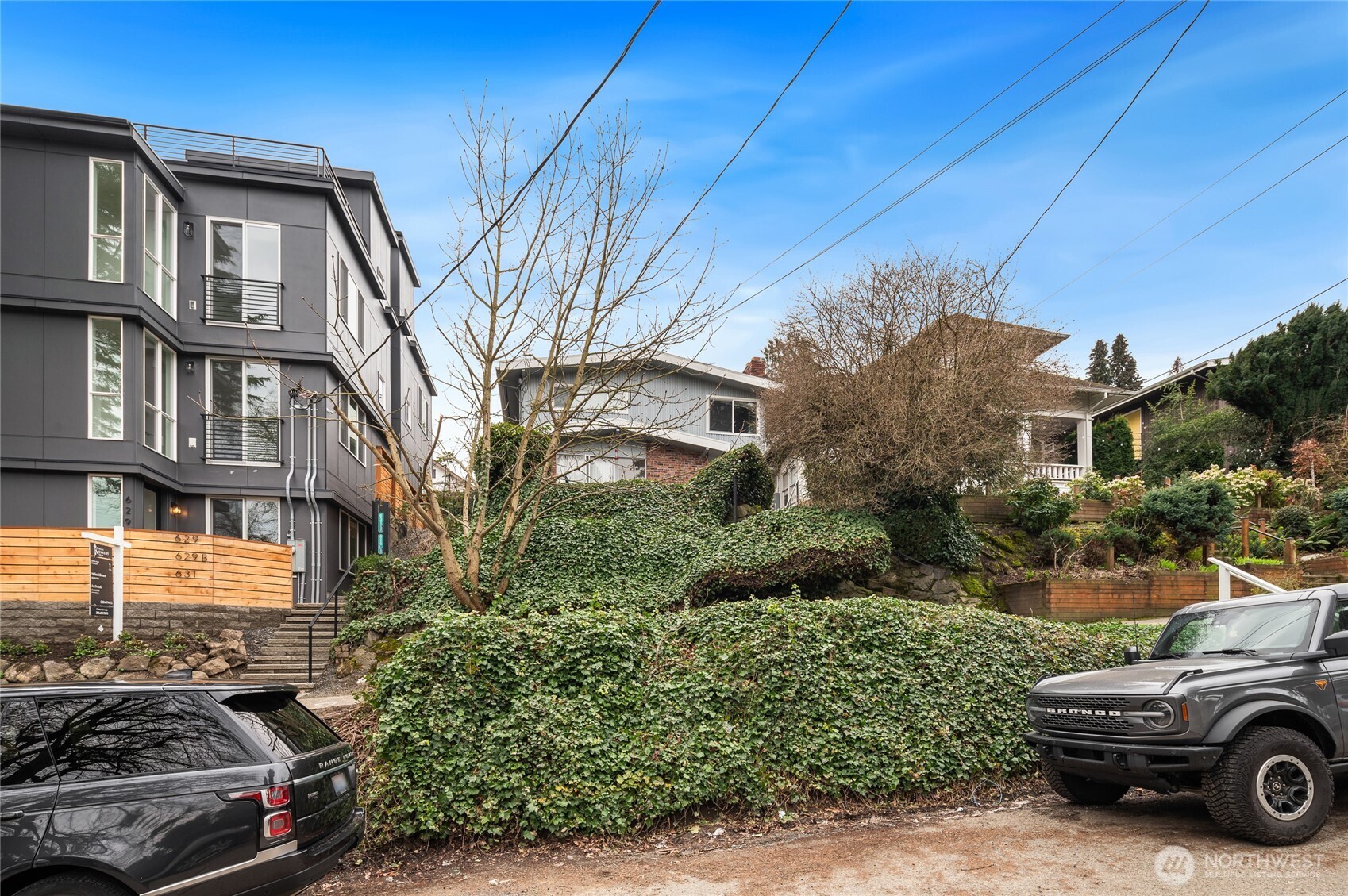 633 West Emerson Street Seattle, WA 98119 - Photo 7 of 25 a view of a car parked in front of a house