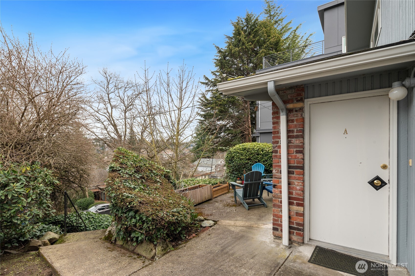 633 West Emerson Street Seattle, WA 98119 - Photo 9 of 25 a view of a outdoor space with a car park