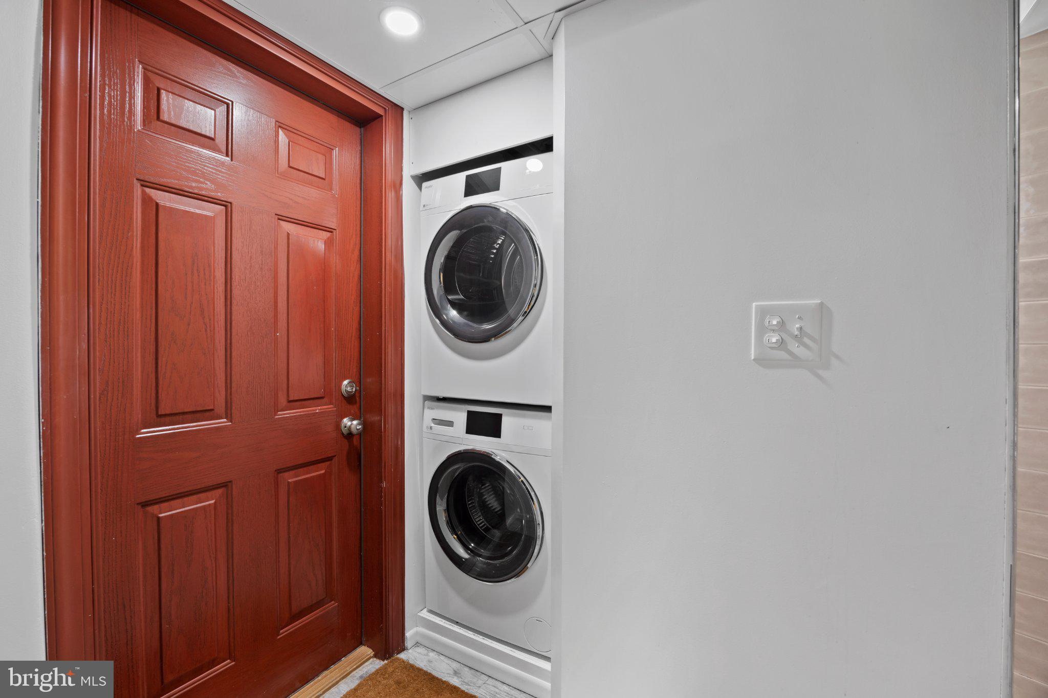 6705 New Hope Drive Springfield, VA 22151 - Photo 46 of 67 Efficient laundry nook by the entrance.