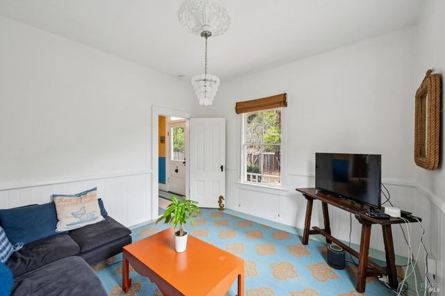 a view of a room that has a window in it