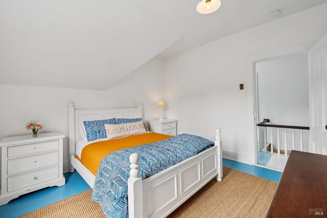a view of a patio with table and chairs and potted plants