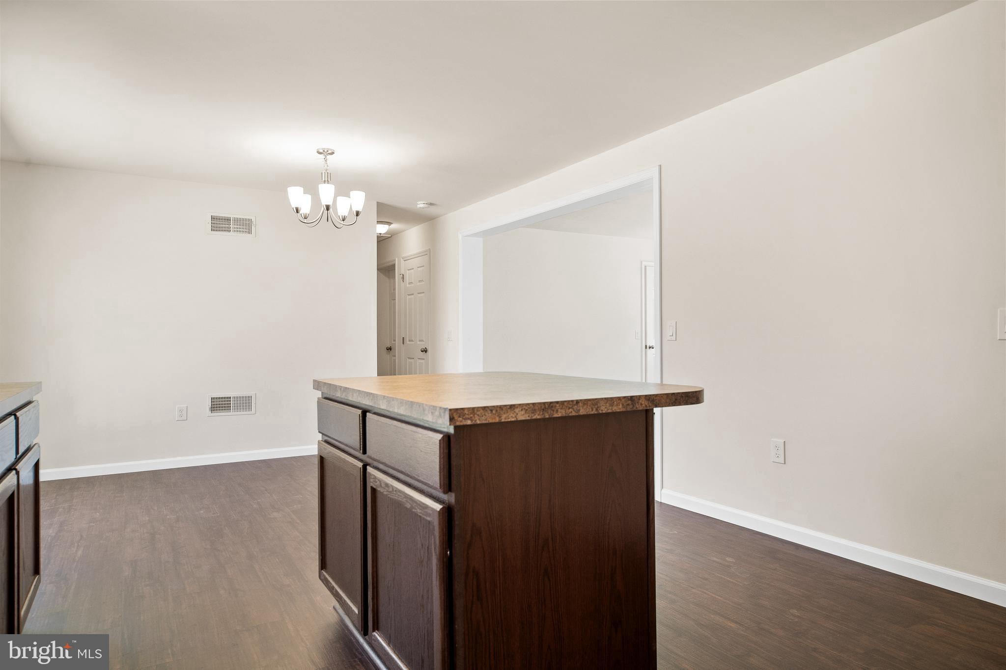 666 Irving Avenue Bridgeton, NJ 08302 - Photo 11 of 41 an empty room with a mirror