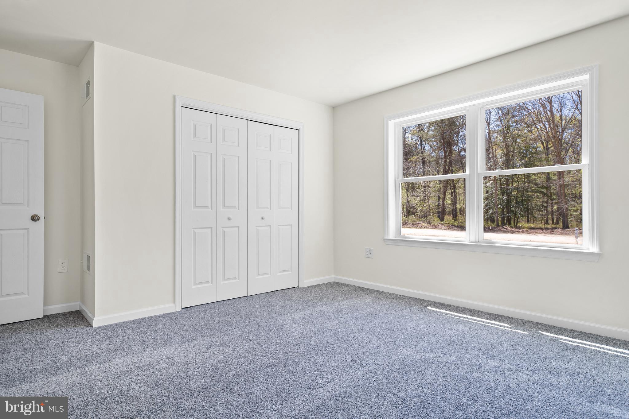 666 Irving Avenue Bridgeton, NJ 08302 - Photo 22 of 41 an empty room with windows