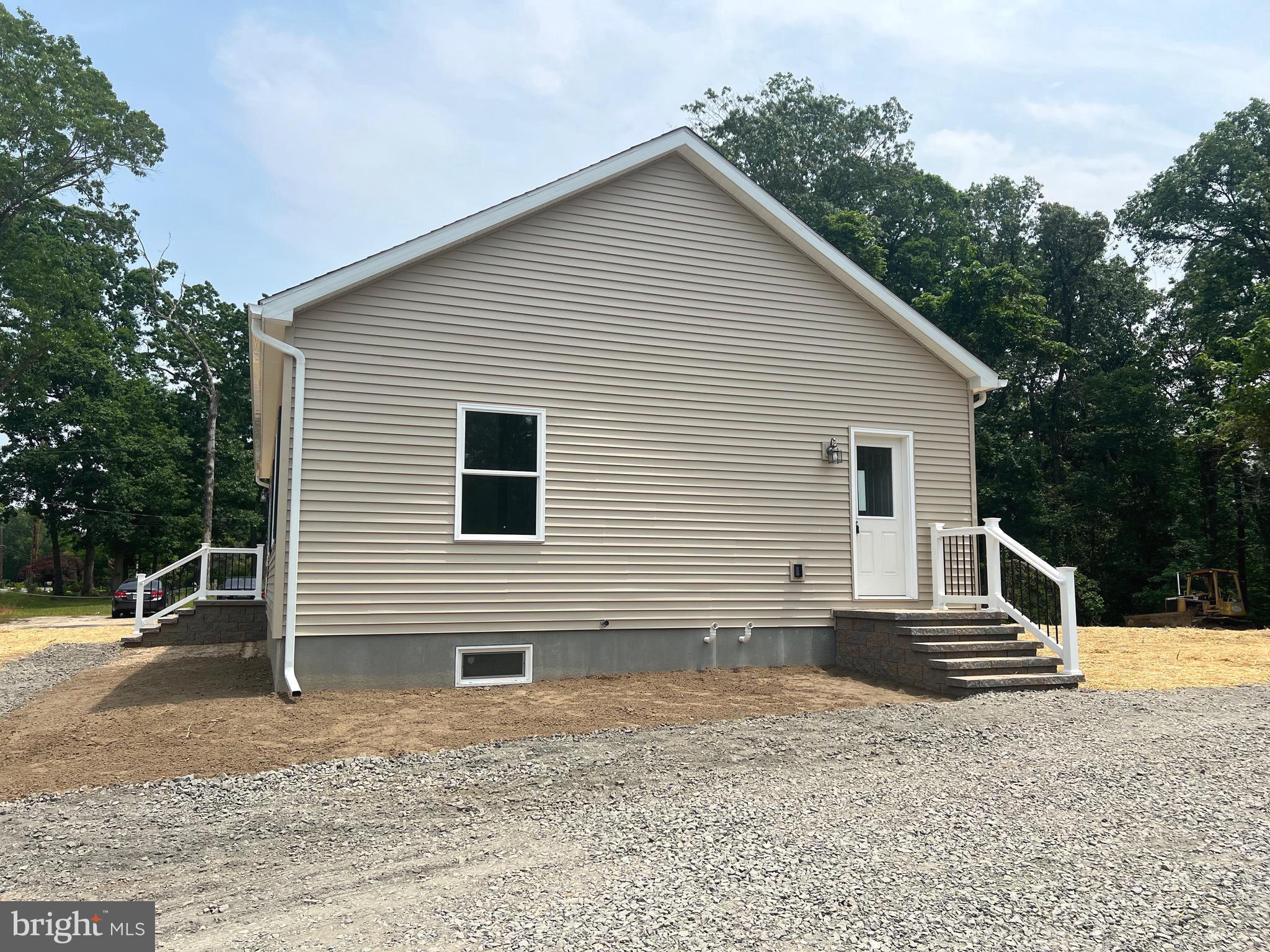 666 Irving Avenue Bridgeton, NJ 08302 - Photo 39 of 41 a view of a house with backyard and trees