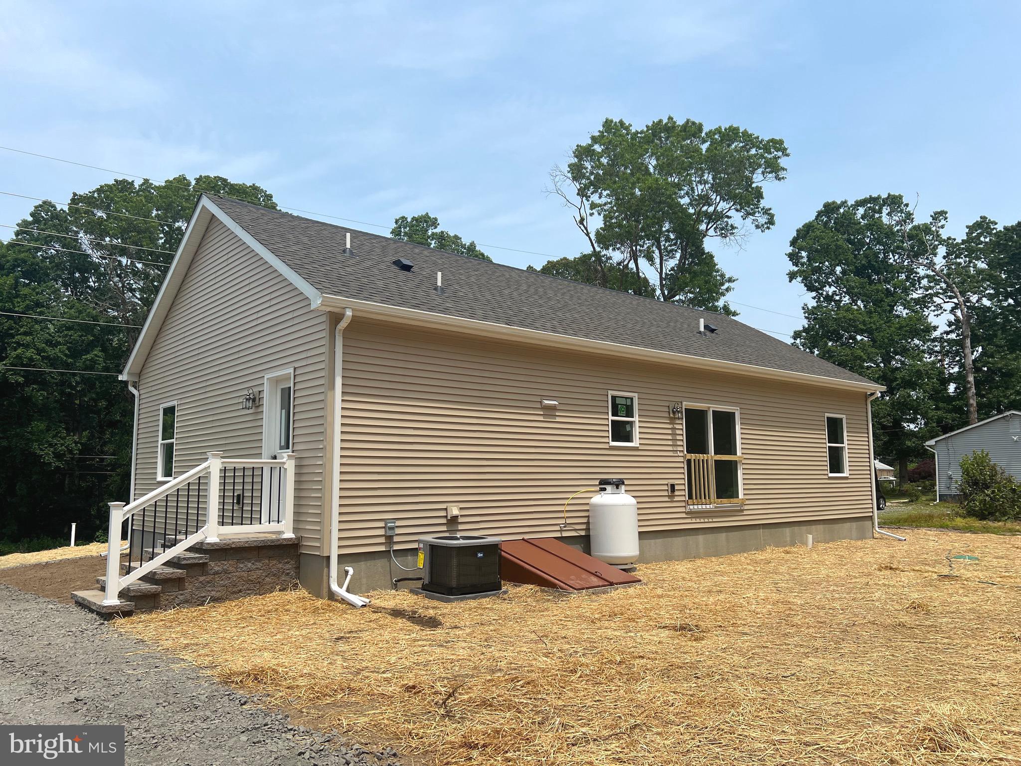 666 Irving Avenue Bridgeton, NJ 08302 - Photo 40 of 41 a view of a house with a yard covered in snow