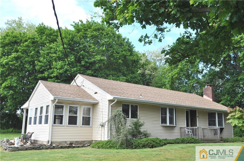 547 Ridge Road Monmouth Junction, NJ 08852 - Photo 1 of 25 a view of a house with a yard