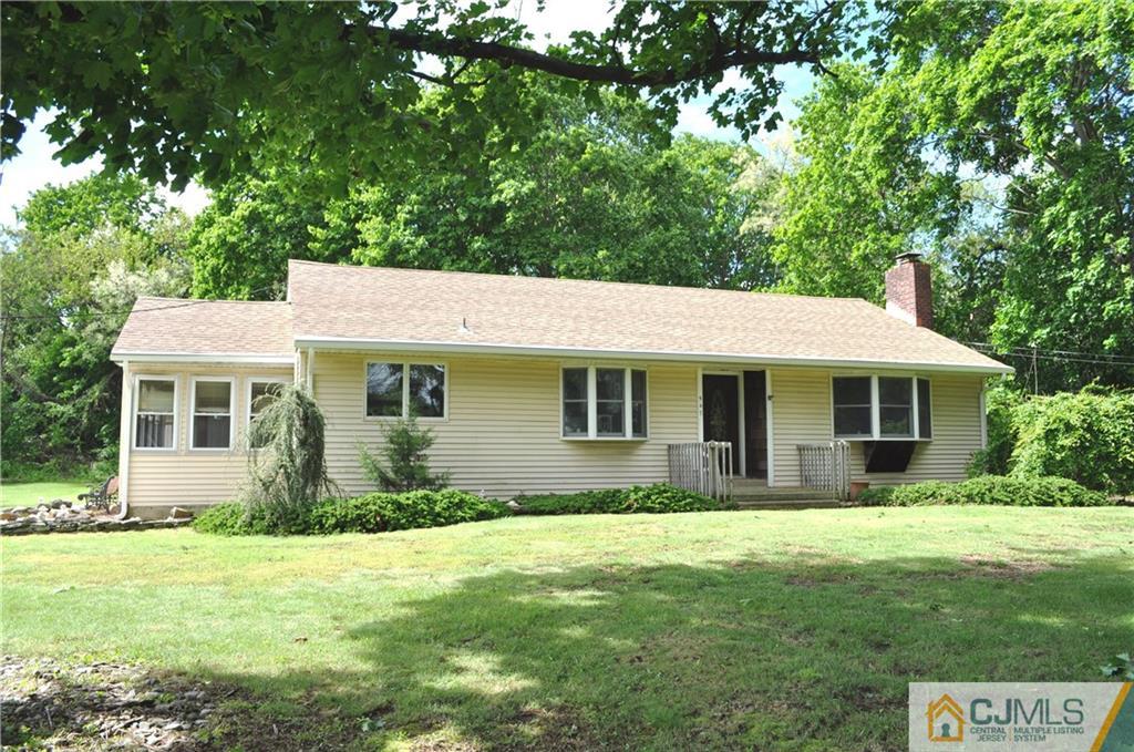 547 Ridge Road Monmouth Junction, NJ 08852 - Photo 2 of 25 a front view of a house with garden
