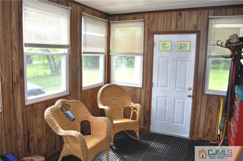 547 Ridge Road Monmouth Junction, NJ 08852 - Photo 15 of 25 a balcony with furniture and a window