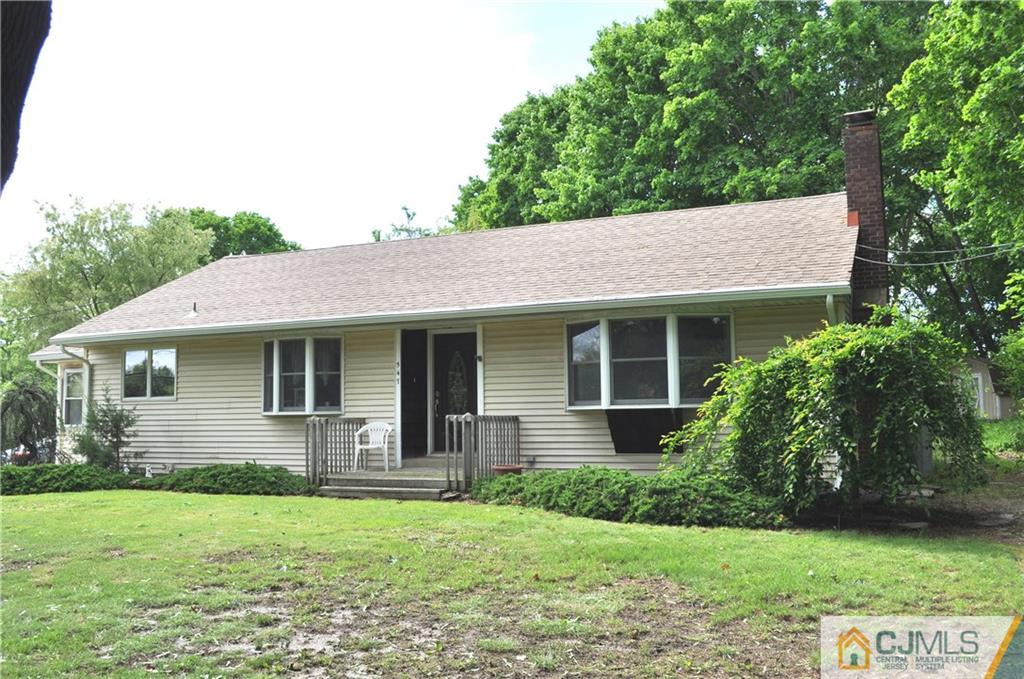 547 Ridge Road Monmouth Junction, NJ 08852 - Photo 3 of 25 a view of a house with yard and a garden