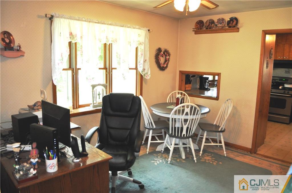 547 Ridge Road Monmouth Junction, NJ 08852 - Photo 9 of 25 a dining room with furniture and window