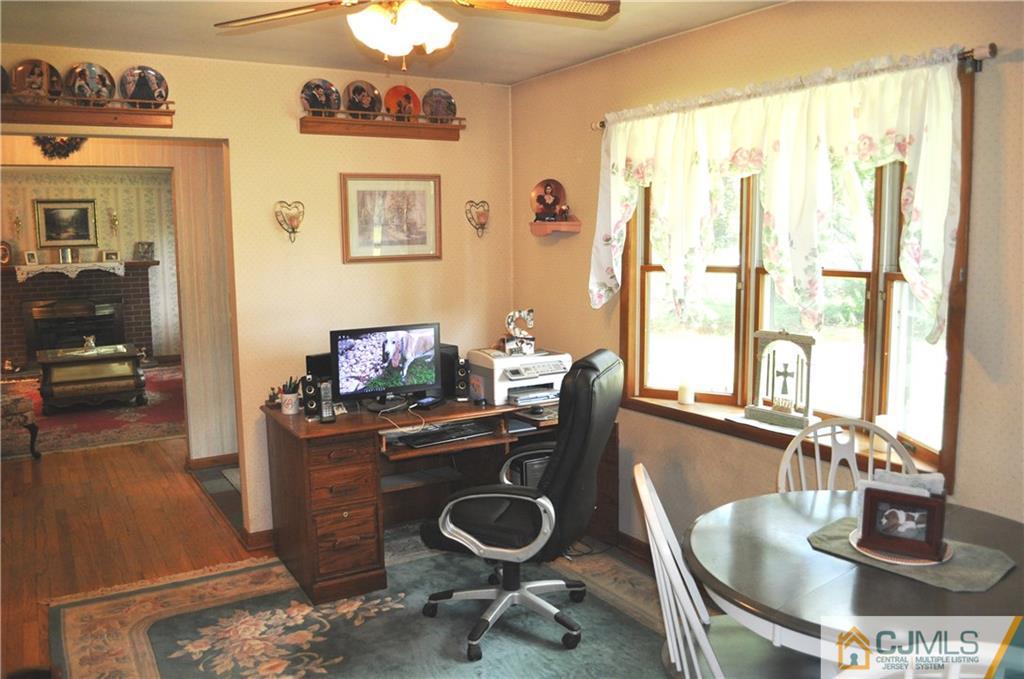 547 Ridge Road Monmouth Junction, NJ 08852 - Photo 10 of 25 a dining room with table and chairs