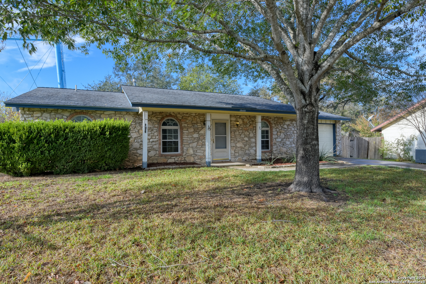 a house with trees in front of it