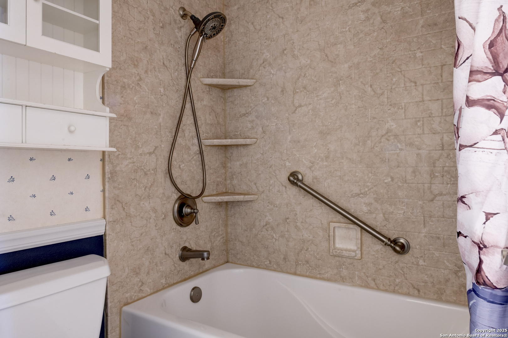 12401 Trailing Oaks Street Live Oak, TX 78233 - Photo 11 of 31 a bathroom with a bath tub and a shower