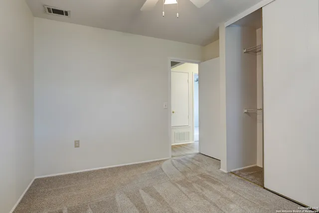an empty room with an entryway