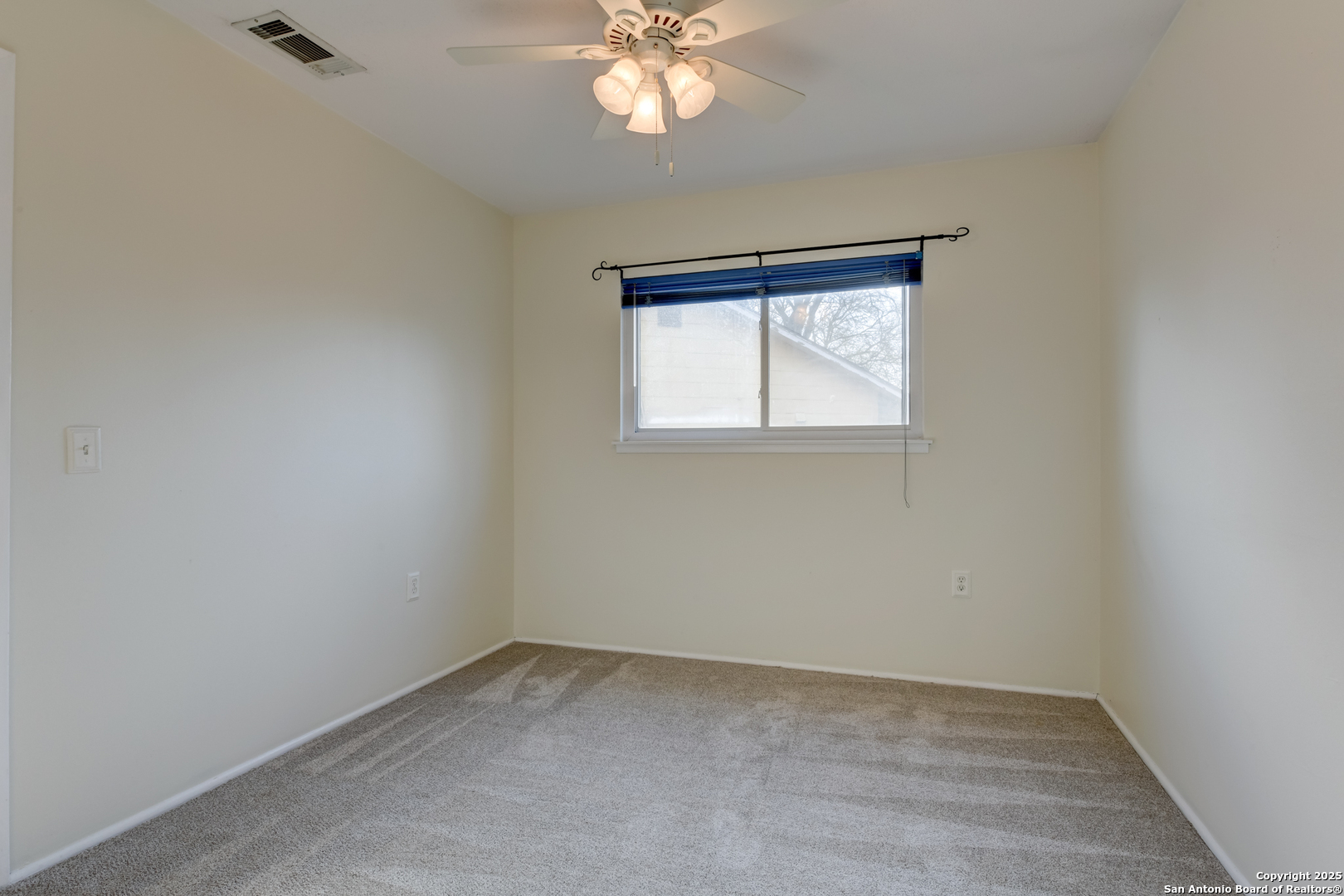 12401 Trailing Oaks Street Live Oak, TX 78233 - Photo 18 of 31 an empty room with a window