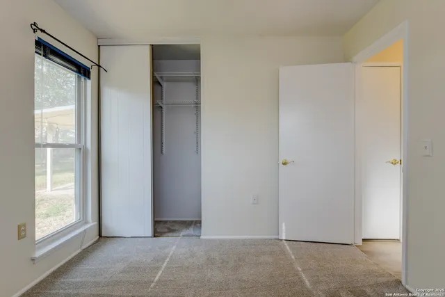 a view of an empty room with window