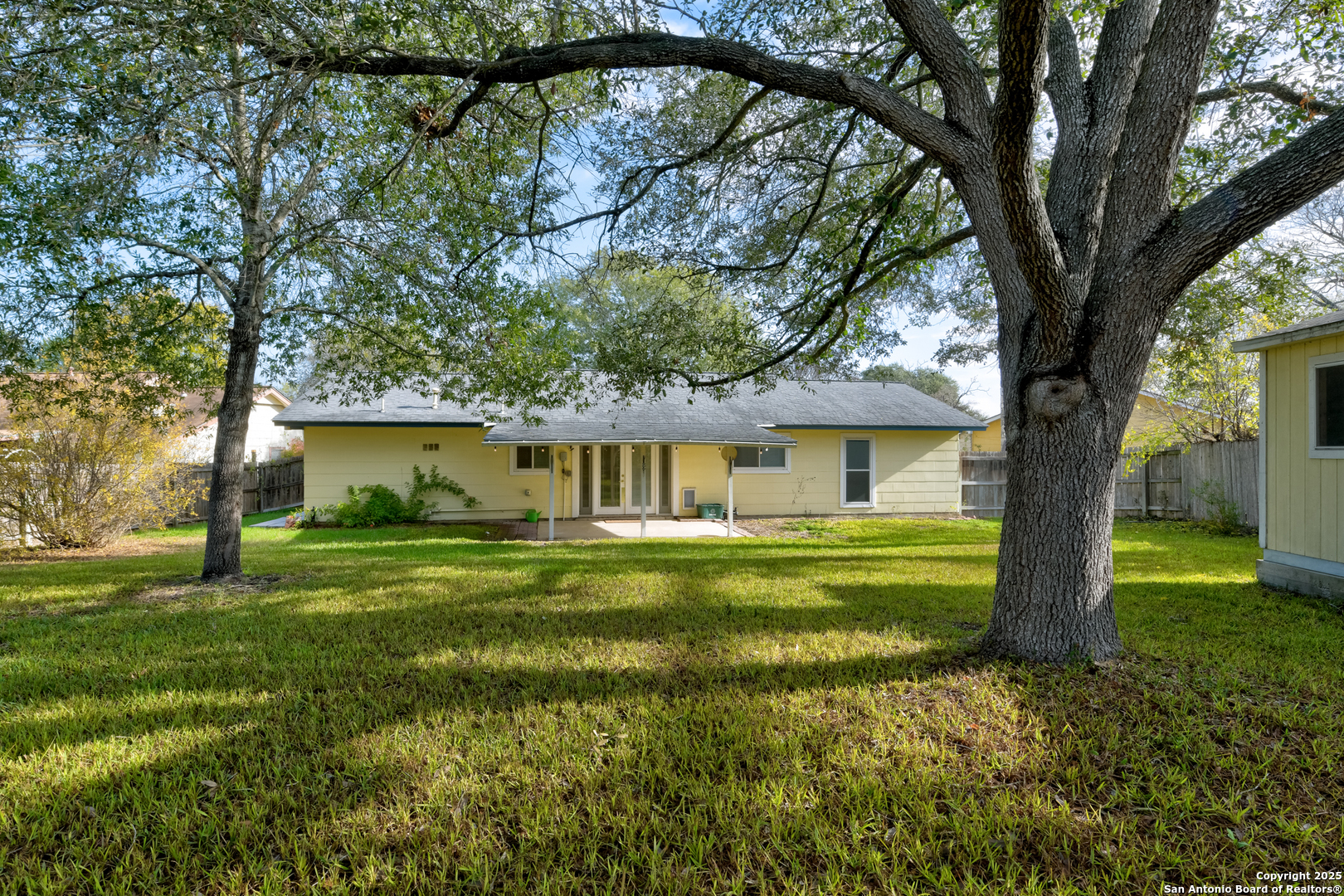 12401 Trailing Oaks Street Live Oak, TX 78233 - Photo 2 of 31 a view of a house with a yard