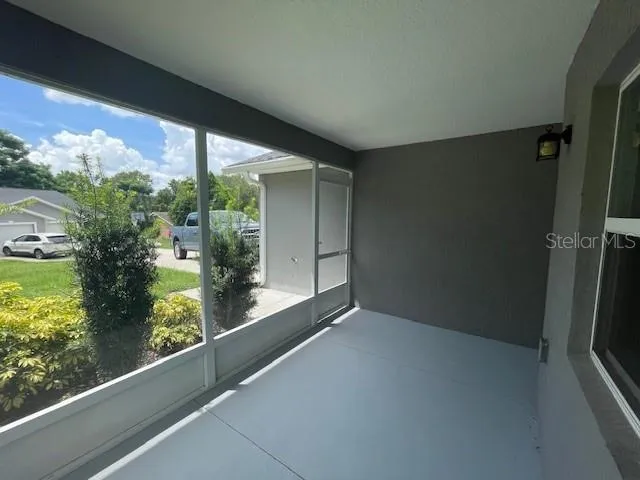 a kitchen with stainless steel appliances a refrigerator and a stove top oven